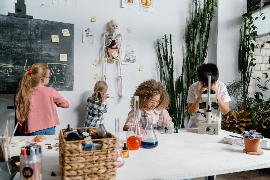 Image of a modern classroom with diverse students engaged in various activities.