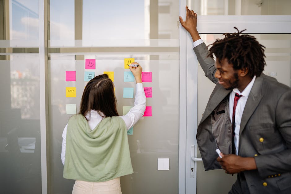 A diverse group of entrepreneurs collaborating in a modern workspace.