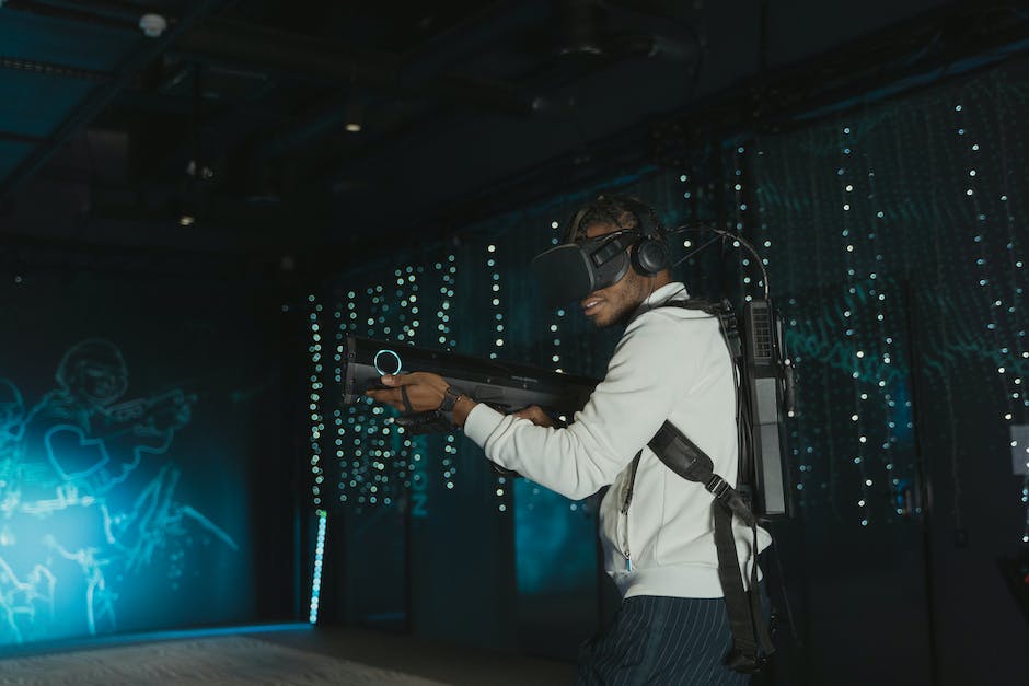 An image featuring a gamer with a headset, controller, and immersed in a gaming session.